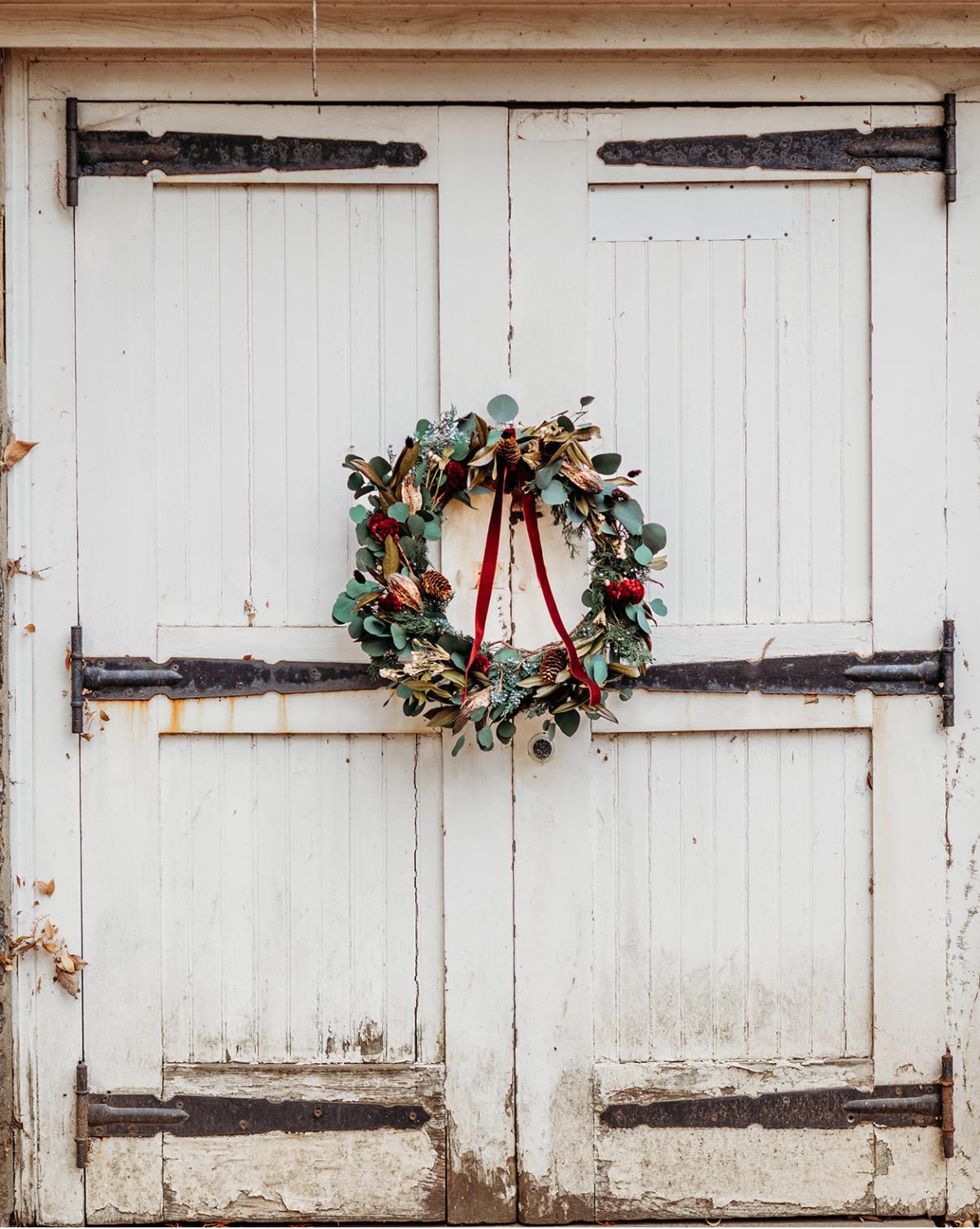 Holiday wreath featuring preserved eucalyptus and juniper, dried celosia, pods and pinecones and a gorgeous red wine velvet ribbon.
Adorn a wall, mantel or sheltered door; this dried flower wreath is the perfect way to add beauty to your space.
