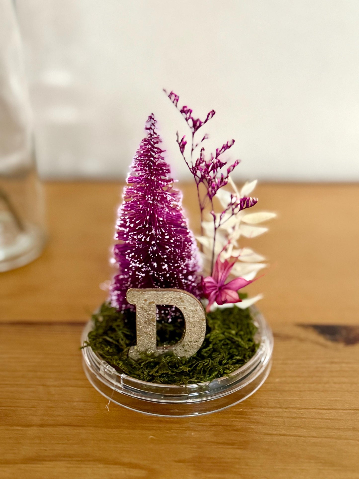 Personalized with initial Ornament - Preserved moss, caspia, nigella, bottlebrush tree and a sparkly gold wooden letter on a moss base; hung by a pine green color velvet ribbon.